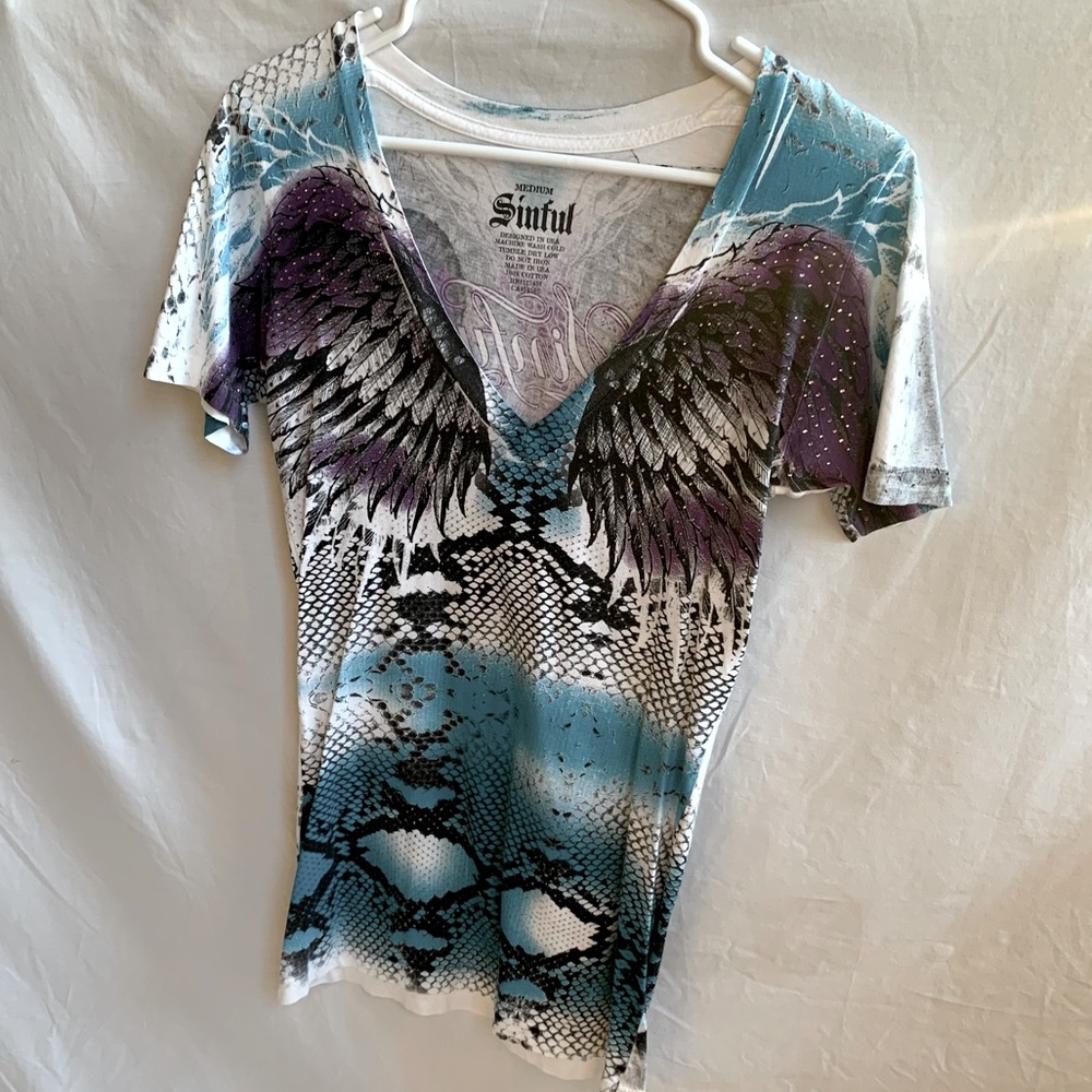 Sinful white, purple, and teal tee